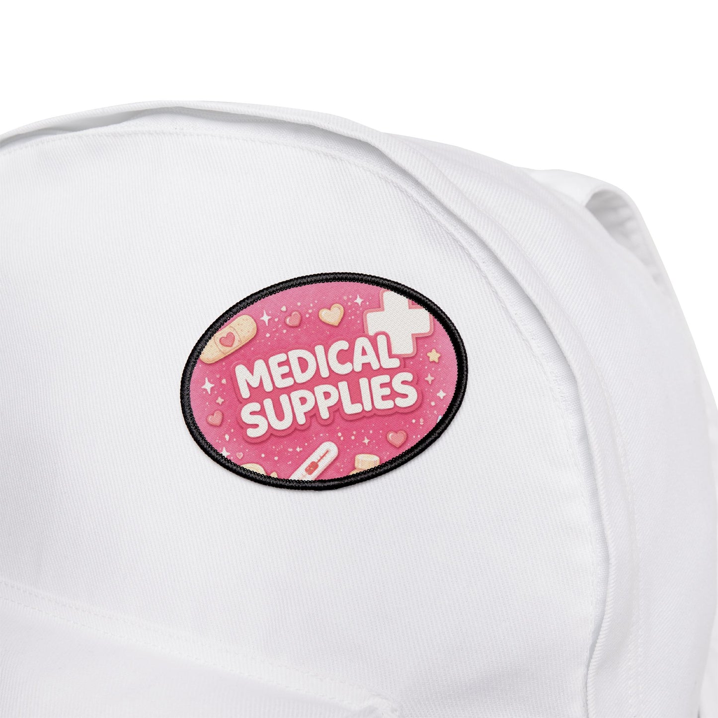 White cap with a pink 'Medical Supplies' patch on a white background